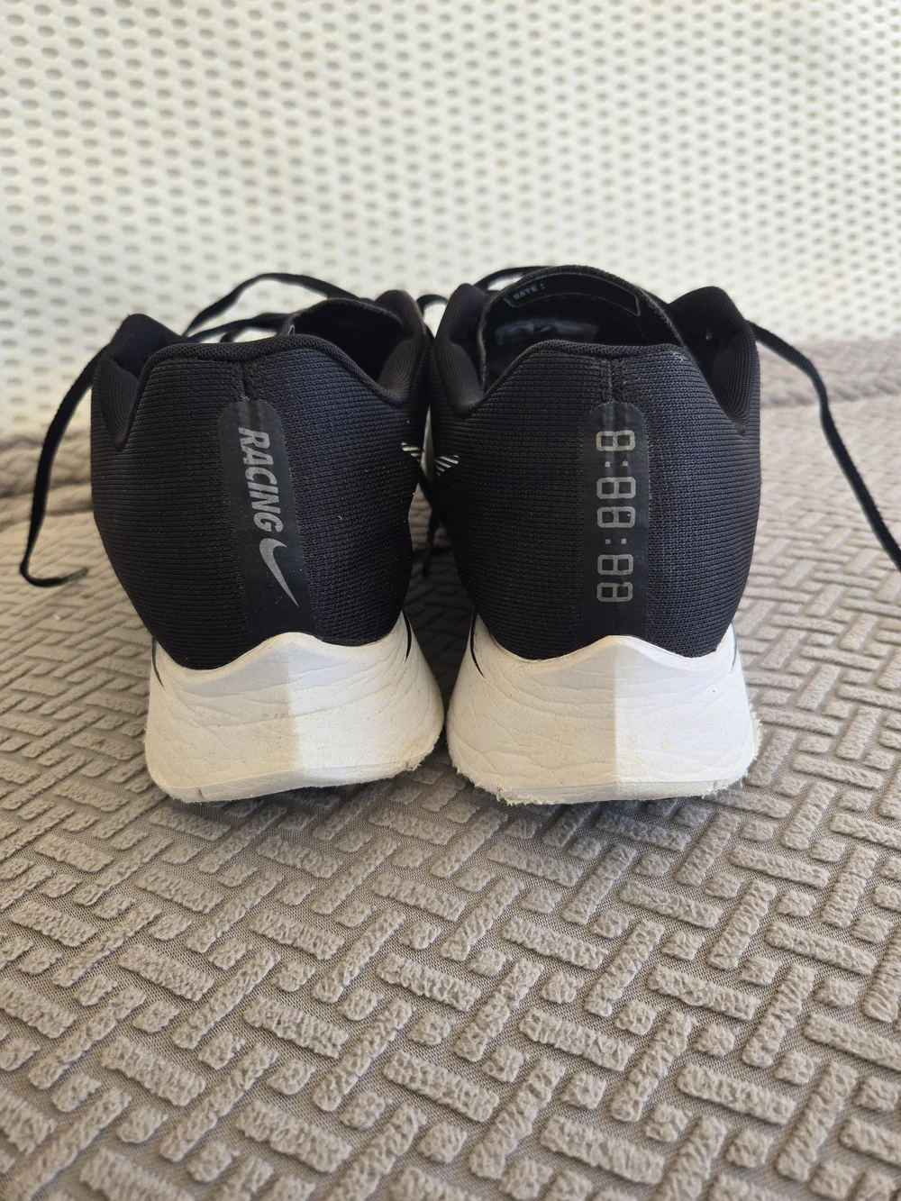 Nike Men’s Black Running Shoes with White Swoosh